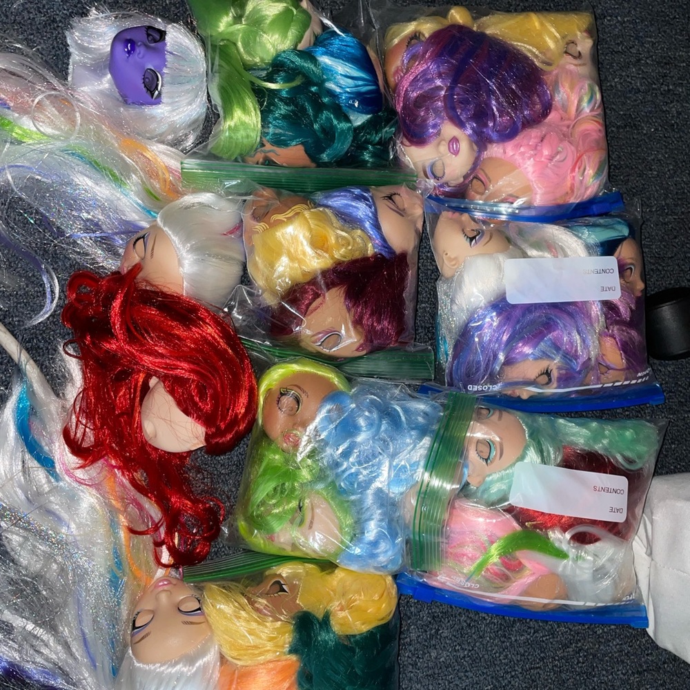 30 doll heads
